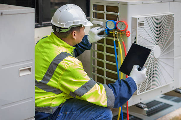 Professional Air Conditioning Repair technician working in Vincennes, IN